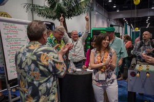 A surprised and excited reaction from Matt Dennard of A&L Music Co. as he wins the Hesch scholarship fund's grand prize: an all-expenses paid vacation!