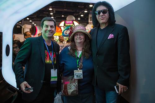 Apple CEO Allen Weisberg poses with Cindy Gardner Vance and KISS legend Gene Simmons.
