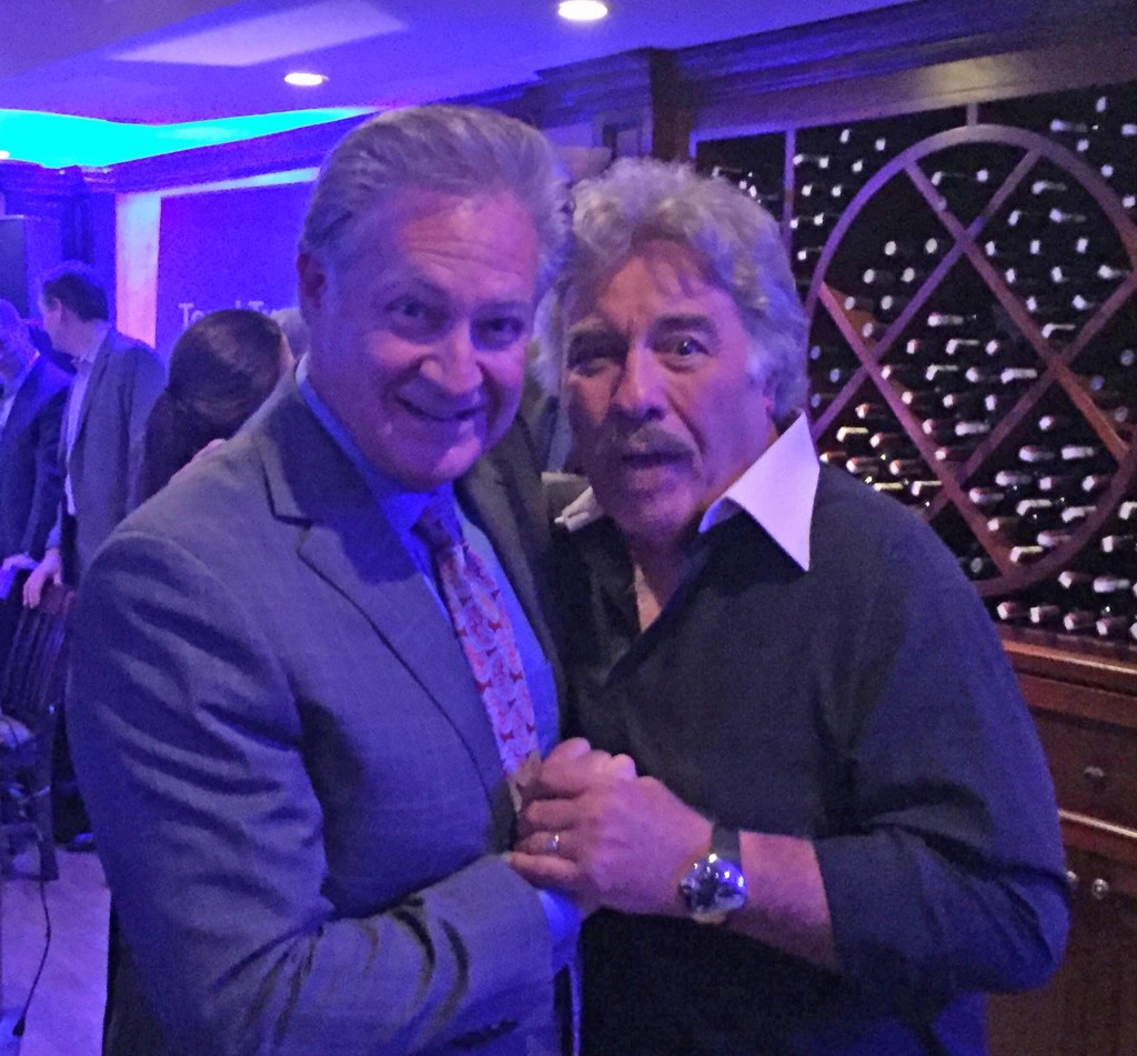 AMI Entertainment's John Margold gets a hug from music legend Tony Orlando. John said the star's sincere appreciation for the impact the jukebox had on his career was "amazing."