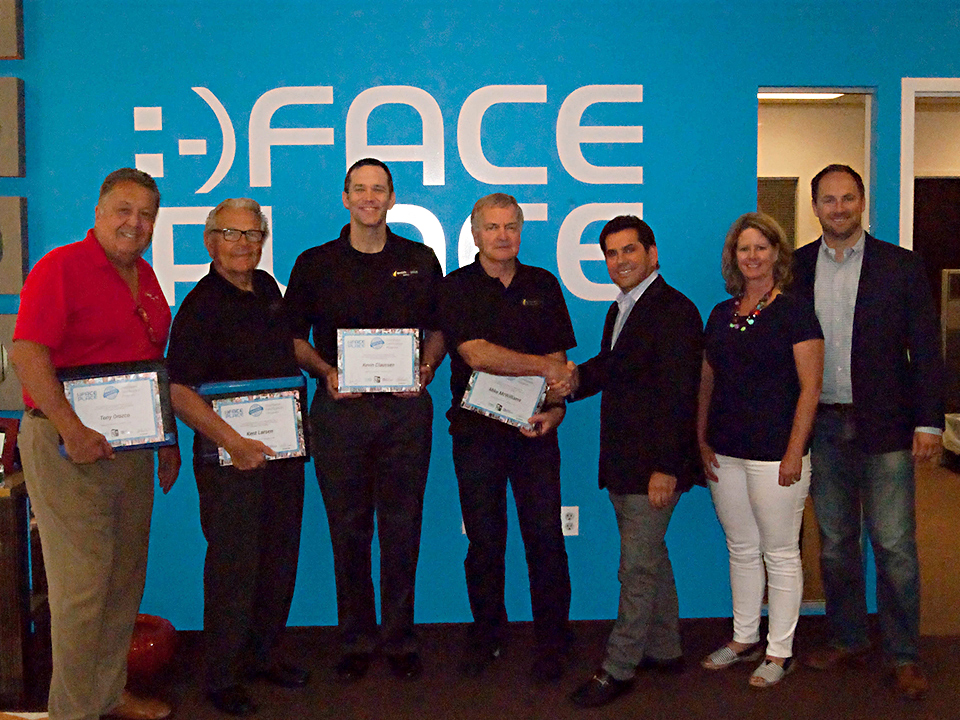 From left to right: Specialty Coin's Tony Orozco, Kent Larsen, Kevin Claussen and Mike McWilliams were tutored on the intricacies of Face Place products by Allen Weisberg, Kris Link and Scott Avery.