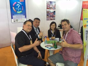 PrimeTime Amusements' David Goldfarb sent us this pic from early in the show of him (at right) with Trifecta Management's Mike Auger (left) and Wahlap's Wang Shen and Lucy Chan.
