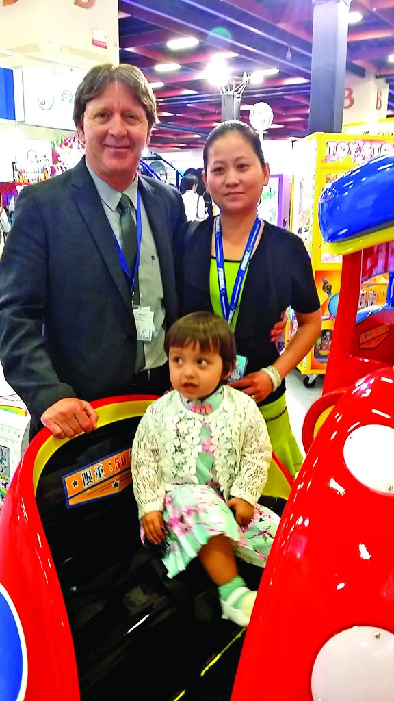 Jeff and May Smart with their daughter April.