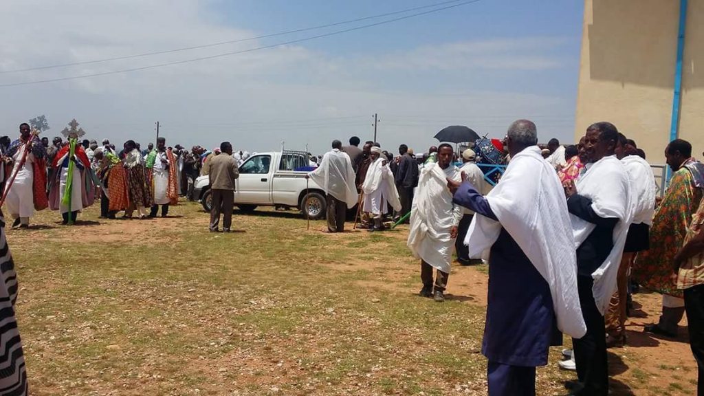 This funeral photo shows the crowd in the small village in Eritrea where Damtew was buried.The Eritrean government arranged the funeral and over 3,000 people from his mother's village attended to honor him.