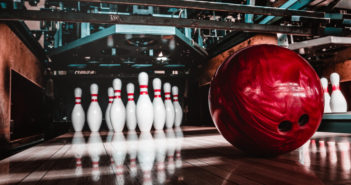 Georgia Bowling Alleys Can Open Friday; Other Govs Make Reopening Moves Bowling artsy shot of pins and ball - Adobe Stock