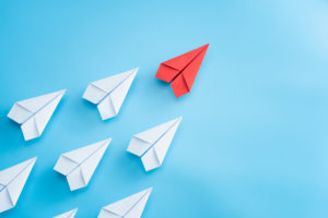 Leaders Lead paper airplane pic from Adobe stock