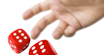 Adobe stock image - hand throwing dice