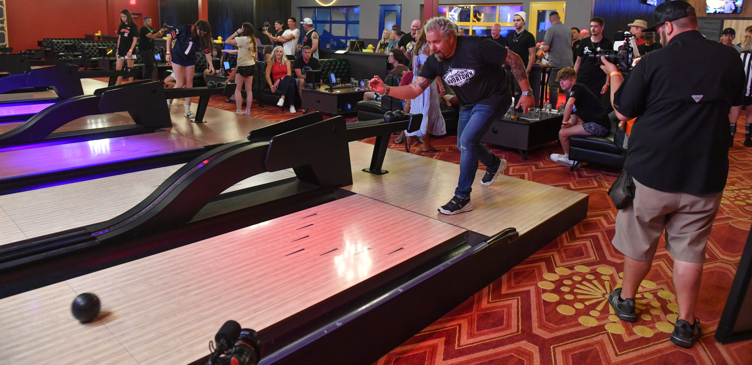 Guy Fieri bowls at Flavortown