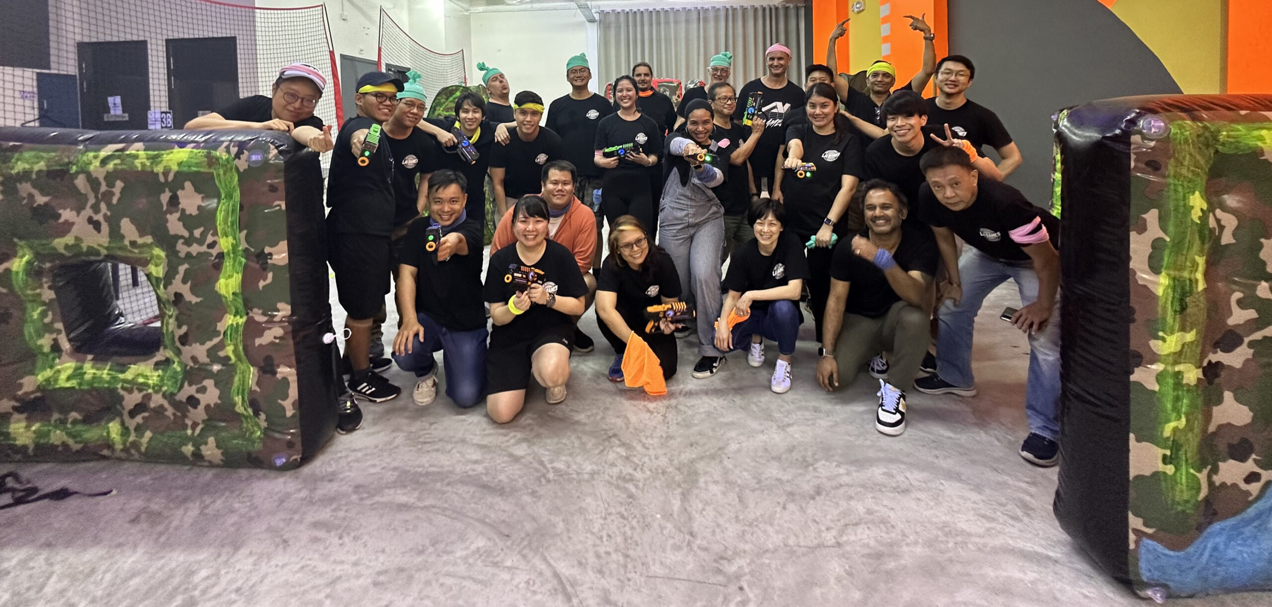 LAI Games Singapore team plays laser tag in the US.
